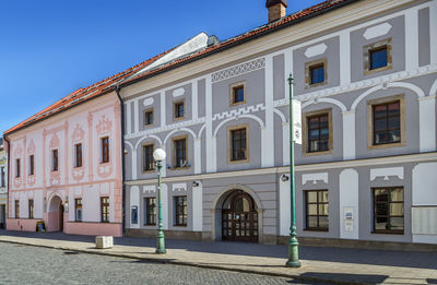 Street with historical houses in kezmarok old town, slovakia