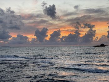 Scenic view of sea against sky during sunset