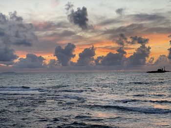 Scenic view of sea against sky during sunset