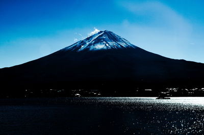 View of mountain against blue sky