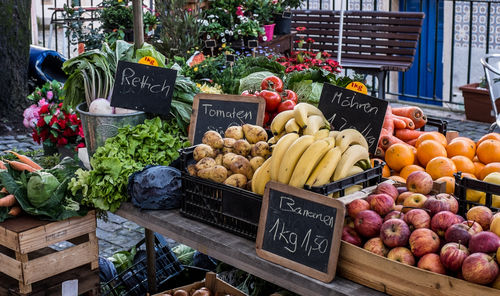 Fruits and vegetables for sale at market stall