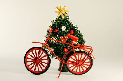 Close-up of christmas tree against white background