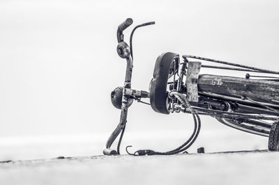 Close-up of metal against sky