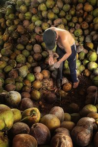 High angle view of shirtless man for sale in market