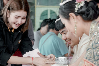 Happy young woman in traditional clothing