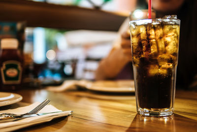 Close-up of beer in glass on table