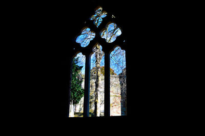 Low angle view of window in temple