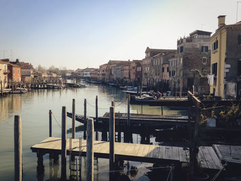 Boats moored at harbor