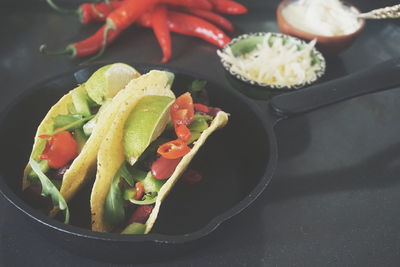 High angle view of salad in pan on table