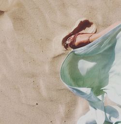 Womans feet on sand