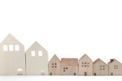 Houses in barn against clear sky