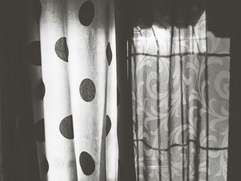 Close-up of curtain against window