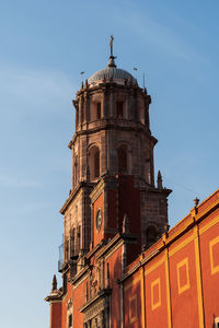 Low angle view of church against sky