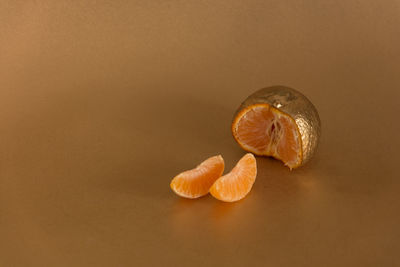 Close-up of bread against orange background