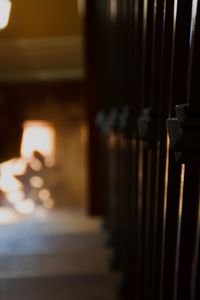 Close-up of illuminated candles in building