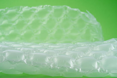 Close-up of cake against white background