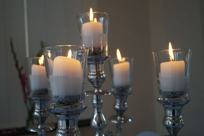 Close-up of illuminated tea light candles