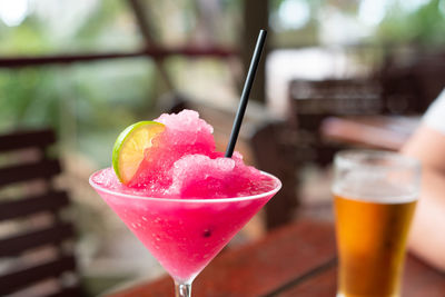 Close-up of drink on glass table