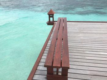 High angle view of swimming pool by sea against sky