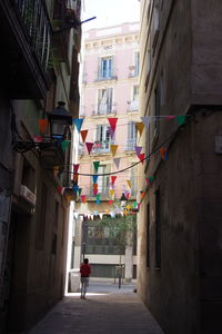 Narrow alley along buildings