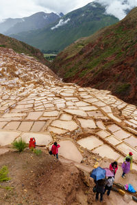 High angle view of people at salt mine