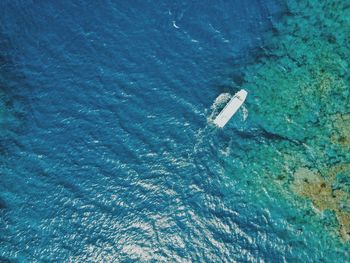 High angle view of ship sailing in sea