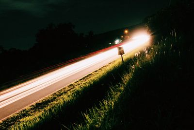 Light trails on road at night