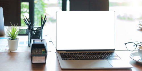 Close-up of laptop on table