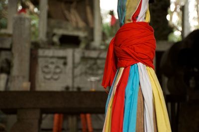 Multi colored umbrella against temple