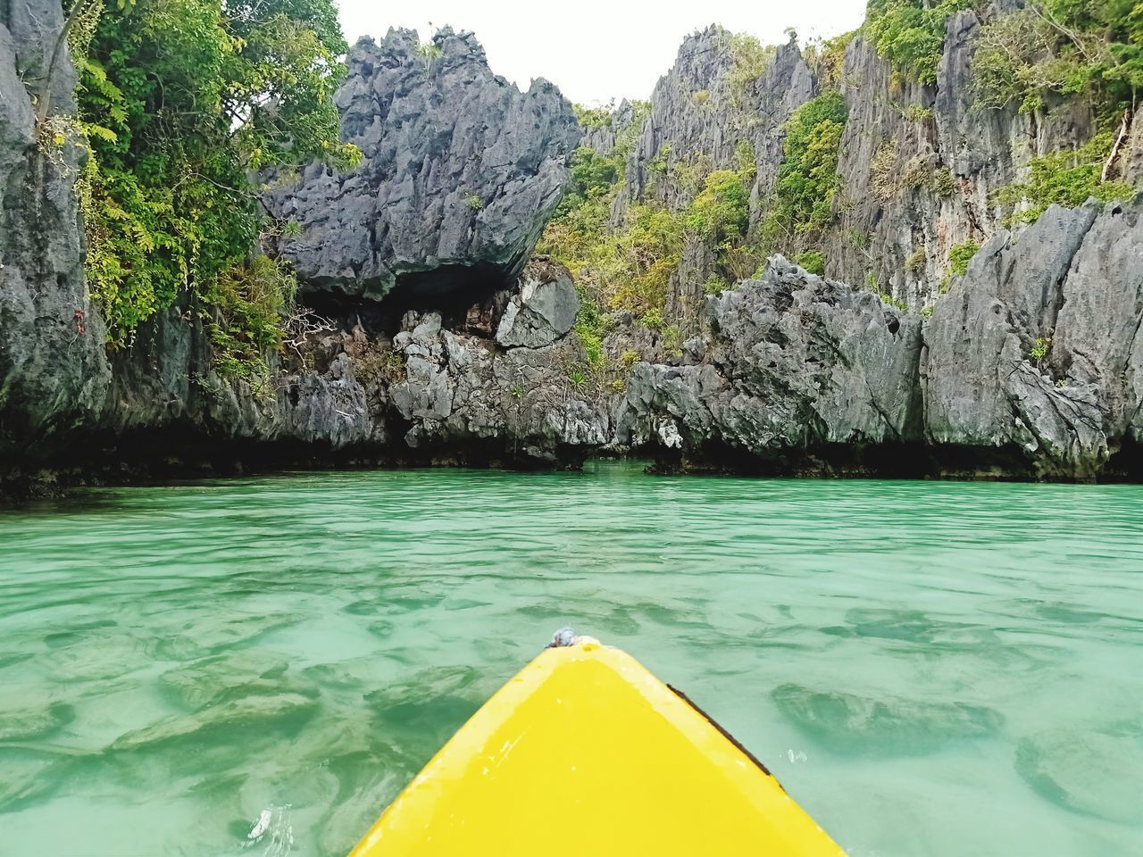 SCENIC VIEW OF SEA AND ROCK FORMATION