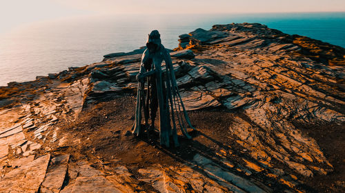 Aerial view around the monument to king arthur in britain monument close up on sea background.