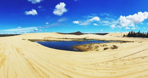 Panoramic view of desert against sky