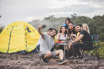 People sitting on mobile phone