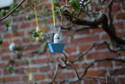 Close-up of toy on wall