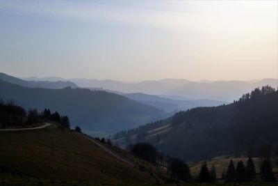 Scenic view of mountains against sky during sunset