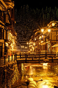 Illuminated street light at night