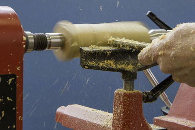 Close-up of wood turning on a lathe