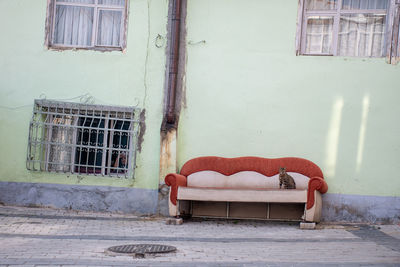 Old chair outside house