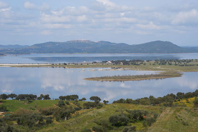 Lake reservoir water reflection of alqueva dam landscape in alentejo, portugal