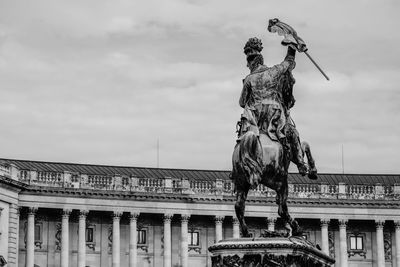 Low angle view of statue against sky