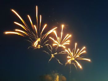 Firework display at night