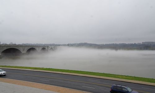 Scenic view of bridge over river against sky