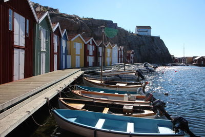 Wooden boats moored on the shore in sweden