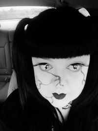 Portrait of woman in car