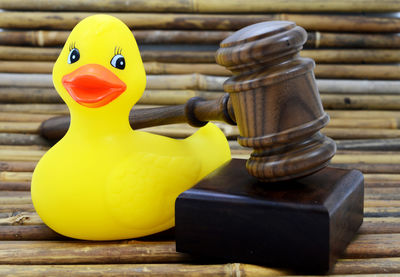 Close-up of yellow toy on table