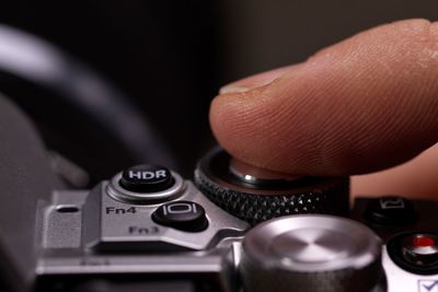 Close-up of hand photographing