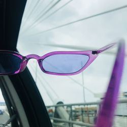 Close-up of sunglasses on glass