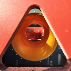 Close-up view of red mirror