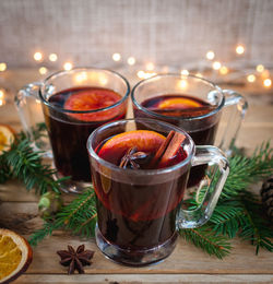 Christmas mulled wine on wooden background
