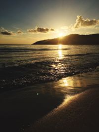 Scenic view of sea at sunset